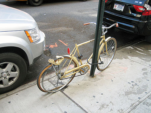 crushed bike on 15th street and 9th ave, nyc